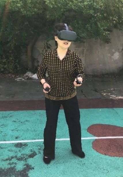 A Chinese elderly playing VR games in a public space